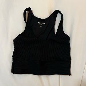 Year of Ours black “ribbed gym bra”